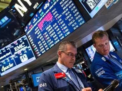 الأسهم الأمريكية تسجل انخفاضاً وسط ترقب الأسواق لمحضر الفيدرالي الأمريكي