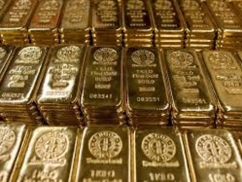 الذهب يبتعد عن ذروة 3 أسابيع بسبب انتعاش الدولار الأمريكي