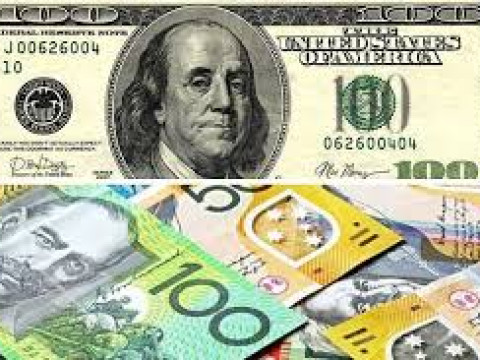 الدولار الأسترالي يرتفع لأول مره في 3  جلسات أمام نظيره الأمريكي