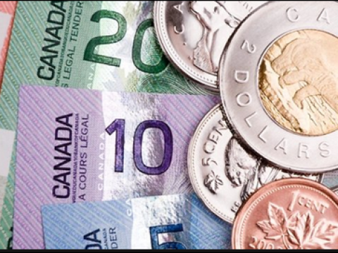 تراجع الدولار الكندي مقابل الدولار