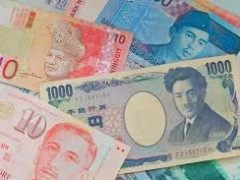العملات الآسيوية تتراجع مع ارتفاع الدولار مع قيام المتداولون بإعادة النظر حول تخفيضات أسعار الفائدة
