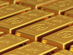 الذهب يسجل تراجعاً ويهبط لأقل من 1900 دولار