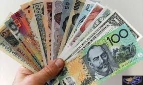 توسع الفائض التجاري في استراليا يدفع الدولار الأسترالي إلى الارتفاع