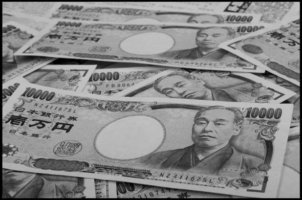 الين الياباني ينخفض نحو أقل مستوياته في مقابل الدولار